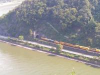 Departmental train running southwards alongside the Rhein. This was the original main line between Cologne and Frankfurt before construction of the high speed line in the 1990s.<br><br>[Paul D Kerr 19/07/2006]