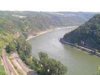 Rhein gorge looking southwards. Heavy freight, one of the 210 freight trains per day on this line, approaches on the east bank. Intercity trains use the line on the opposite bank of the river. Oh, and the scenery is not bad either...<br><br>[Paul D Kerr 19/07/2006]