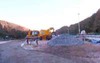 Dunkeld goods yard is a temporary source of infill material after an embankment slip near Dalguise. A railtruck is being loaded.<br><br>[Brian Forbes 18/12/2006]