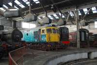 Strange bedfellows in Barrow Hill roundhouse.<br><br>[Ewan Crawford 18/11/2006]