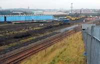 The shed still stands, some track replacement is taking place, more ground clearance has gone ahead, a fence is going up and there are more vehicles.<br><br>[Ewan Crawford 20/12/2006]