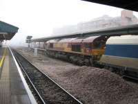 66159 waiting to head east with a stone-train as fog engulfs the surrounding buildings.<br><br>[Michael Gibb 21/12/2006]