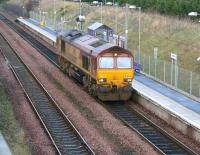 EWS 66234 passes through Brunstane on its way from Powderhall back to Millerhill on 20 December 2006 having worked the morning <I>'Binliner'</I> to Oxwellmains.<br><br>[John Furnevel 20/12/2006]