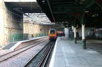 <I>Thats better..</I> View east as the 1105 Voyager for Birmingham New Street arrives for boarding at 19 alongside the new Balmoral platform in December 2006.<br><br>[John Furnevel /12/2006]