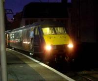 The driver of the 0800 GNER service to Kings Cross awaiting the departure whistle.<br><br>[Graham Morgan 23/12/2006]