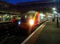 390001 Virgin Pioneer waits to depart with a London Euston service.<br><br>[Graham Morgan 23/12/2006]