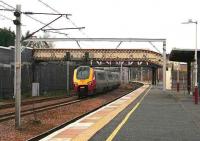 Northbound through Carstairs station - Dec 2006.<br><br>[John Furnevel /12/2006]