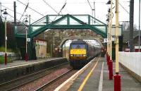 Looking west along the up platform at Drem on 27 December 2006 as an up GNER service rushes through the station on its way to London.<br><br>[John Furnevel 27/12/2006]