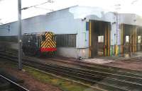 Wabtec shunter 08615 stands outside Craigentinny depot on 28 December. Grab shot from a passing train. <br><br>[John Furnevel 28/12/2006]