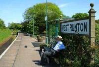 The art of waiting for a train. West Runton, Norfolk in May 2004. One of the two remaining stations of the former Midland & Great Northern Joint Railway. <br><br>[Ian Dinmore /05/2004]