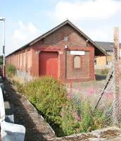 The former goods facilities standing alongside Neilston station in August 2006.<br><br>[John Furnevel 20/08/2006]