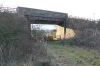 Overbridge to the west of Mawcarse station where the trackbed is crossed by the A911. View looks west. [With thanks to Brian McDevitt for correcting the details.]<br><br>
[Railscot note: this bridge was on a re-alignment of the line from 1890, the opening of the Forth Bridge and Glenfarg line, to ease a curve here. The formation is still visible today and often mistaken for a station.]<br><br>[Brian Forbes 01/01/2007]