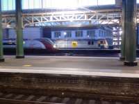 A Class 390 and a Class 92, a rare visitor to Glasgow Central, collecting Caledonian Sleeper ECS<br><br>[Graham Morgan 8/12/2006]