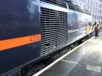 The driver of 43116 The Black Dyke Band getting into his cab.<br><br>[Graham Morgan 30/12/2006]