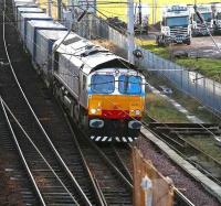 Stobart Rail 66411 <I>Eddie the Engine</I> approaching Carstairs from the south with the Tesco containers on 5 January 2007. <br><br>[John Furnevel 05/01/2007]