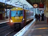 334009 at sits at Platform 2 of Paisley Gilmour Street with a Gourock service.<br><br>[Graham Morgan 05/01/2007]