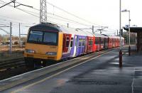 Northern liveried 321901 runs through Carstairs on 5 January 2007 signalled for the Edinburgh line.<br><br>[John Furnevel 05/01/2007]