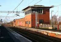 Looking across the running lines at Newton station to the redundant Newton signal box. View west on 5 January 2007.<br><br>[John Furnevel 05/01/2007]