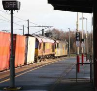 A class 92 hauling a dead class 66 plus a southbound container train passing through Carstairs on 5 January 2007.<br><br>[John Furnevel 5/01/2007]