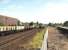 Looking north at Aviemore on 05 July 1991 as 47674 on a PW train stands in the siding opposite the SRS station as a pair of 37s arrives from the north. <br><br>[John McIntyre 05/07/1991]