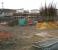 View north over Alloa station site on 22 December 2006. No work taking place. Plastic sheeting covers the base of the station building and a selection of young trees has appeared ready for planting.  <br><br>[John Furnevel /12/2006]