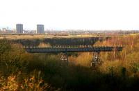 Memories of Ravenscraig. View west on 5 January 2006 over the bridge that once linked the hot metal and slag handling areas (no offence) photographed from a passing train travelling between Holytown and Wishaw. <br><br>[John Furnevel 05/01/2006]