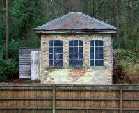 The surviving signal box standing alongside the old Stirling & Dunfermline route at Bogside, looking south in February 2007. The walkway is on the other side of the fence.<br><br>[John Furnevel 20/02/2007]