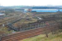 Fencing now installed around part of the works area at Cowlairs on 20 December.<br><br>[Ewan Crawford 20/12/2006]