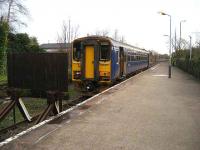 Single car 153 from Preston terminates at Ormskirk on 9 January. Passengers change to an electric service at the other end of the single platform for Liverpool.<br><br>[John McIntyre 9/01/2007]