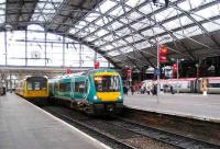 Trains for Manchester Oxford Road (L), Norwich and London Euston stand at Liverpool Lime Street on 9 January 2007. <br><br>[John McIntyre 9/01/2007]