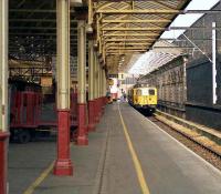 A local class 304 service for Manchester runs into platform 1 at Crewe on 25 August 1990.<br><br>[John McIntyre 25/08/1990]