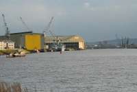 Looking east along the Clyde. On the left is the Strathclyde Transport Yoker/Renfrew Ferry and beyond is Yarrows Shipyard now owned by BAE.<br><br>[Ewan Crawford 09/01/2006]