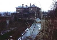 Rear of Kelvinside station showing signs of fire damage. The front of the station, now beautifully restored and in use as a restaurant, faces Great Western Road. Sir J. J. Burnet - Architect.<br><br>[Alistair MacKenzie 15/11/1980]