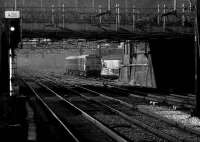 Class 310 on the up slow line approaches Watford Junction under a canopy of catenary on 20 March 1976.<br><br>[John McIntyre 20/03/1976]