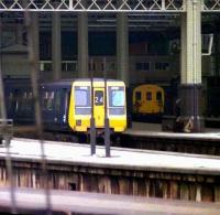 Prototype 4-PEP unit hiding amongst the rabble at Waterloo station in March 1976.<br><br>[John McIntyre 19/03/1976]