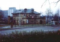 Kelvinside station on Great Western Road still showing fire damage prior to refurbishment and reopening as a restaurant. Sir J. J. Burnet - Architect. Gartnavel Hospital dominates the background. See photograph 15564.<br><br>[Alistair MacKenzie 15/11/1980]