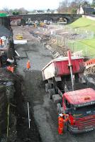 Laying the hardcore in preparation for tracklaying at the old junction for the Devon Valley line. View looks to the old station.<br><br>[Ewan Crawford 27/01/2007]