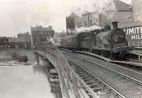 C.R 0.6.0s crossing the River Kelvin at Partick Central. 57607 on Dalmuir to Rutherglen train.<br><br>[G H Robin collection by courtesy of the Mitchell Library, Glasgow 05/08/1957]