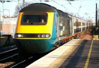 A Midland Mainline liveried HST, currently on lease to Virgin Trains, passing west through Prestonpans station bound for Edinburgh Waverley on 2 February 2007.<br><br>[John Furnevel 02/02/2007]