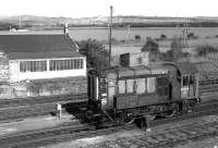 08564 stands at the south end of Millerhill yard alongside the remains of the old station in 1977. <br><br>[Bill Roberton //1977]