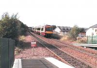 A Glasgow - Grahamston service arrives at Camelon.<br><br>[Brian Forbes /09/2006]