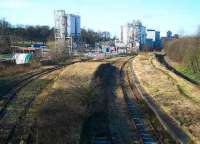 Cameron Bridge in February 2007 looking west towards Thornton Junction. View showing the platform remains with the modernised distillery dominating the background.<br><br>[John Furnevel 11/02/2007]