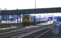 Aberdeen in July 1974. As new construction work starts at the north end of Aberdeen station an Inverness service leaves platform 6. Note the appearance of the steel structure, under which the train has just passed, now spanning platforms 6 and 7.<br><br>[John McIntyre /07/1974]