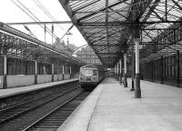 A Class 303 EMU stands at a quiet Helensburgh Central on 23 March 1974. <br><br>[John McIntyre 23/03/1974]