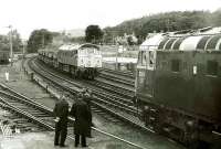 Conversation piece at Pitlochry in 1973 as 5313 waits at the platform to cross a class 24 hauling a ballast train.<br><br>[Bill Roberton //1973]