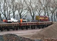 Unloading spent ballast in the sidings along the north eastern edge of the old up yard at Millerhill on Saturday 10 February 2007.<br><br>[John Furnevel 10/02/2007]