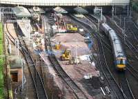 Waverley on 13 February with track laying looking well advanced into the realigned platform 17 as a First ScotRail service runs into 12. Canopy work continues on 15-18.<br><br>[John Furnevel 13/02/2007]