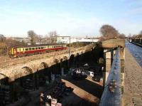 Waverley - Glasgow Central service crossing Slateford Viaduct in January alongside the Union Canal aqueduct.<br><br>[John Furnevel /01/2007]