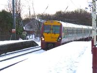 334002 pulling into Johnstone station.<br><br>[Graham Morgan 18/01/2007]