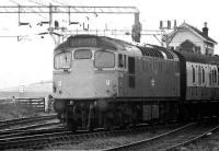 27042 brings a train for Glasgow Queen Street off the West Highland Line at Craigendoran Junction in 1974.<br><br>[John McIntyre //1974]